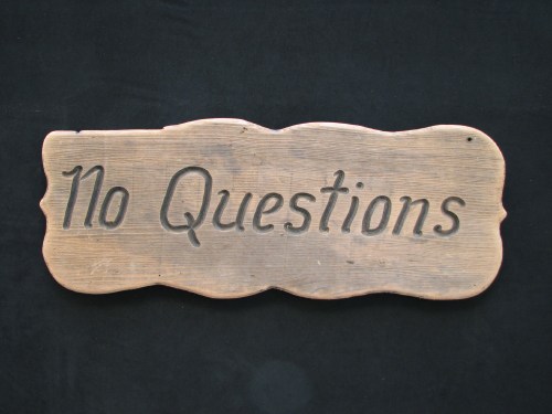 "No Questions", boat plaque