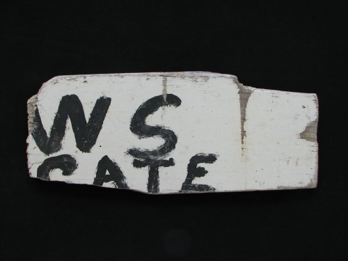 "Waste" sign fragment