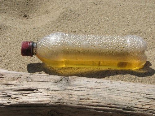 plastic bottle w/yellow fluid