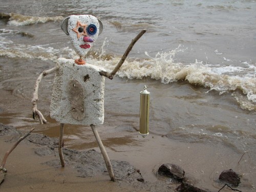 Starry-eyed figure w/ Gold Ornament, 8/09