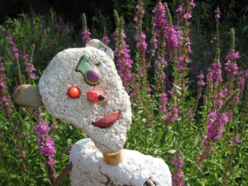 Head of figure on green seat, 8/09