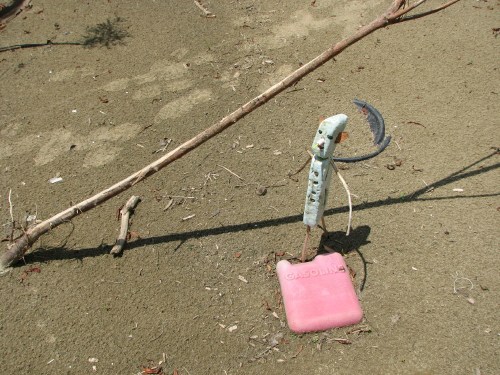 little blue figure with gas can