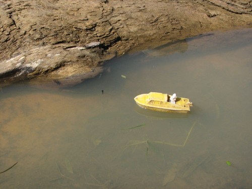 toy boat in puddle, 10/09