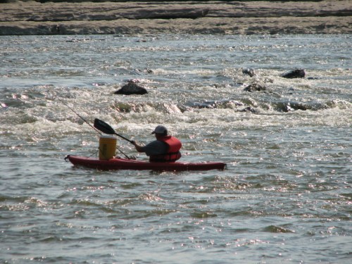 fisherman and small boat, 2010