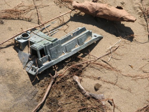 toy tank buried in the sand, 2/2011