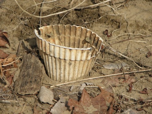 Stained, split, and fluted plastic flower pot, 2/2011