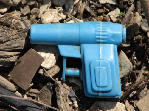 tiny blue squirt gun