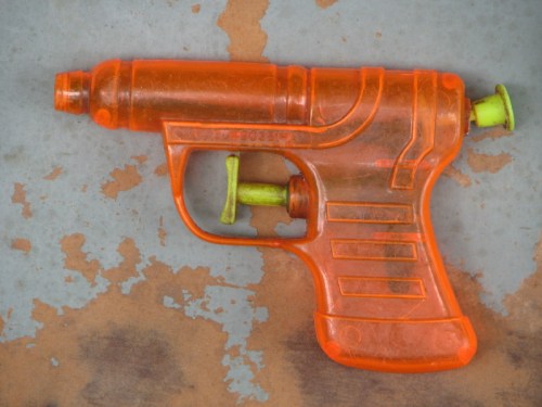 clear orange plastic squirt gun