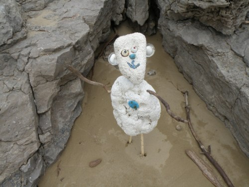 Figure by fossil rocks, Falls of the Ohio, Jan. 2013