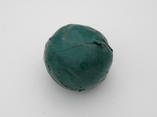 ball made from green plastic tape