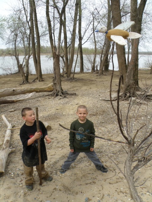 Two local boys with Swept-winged dove, April 2013