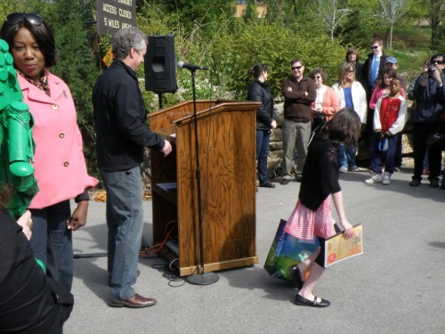 Young lady accepts her prize from the Mayor, April 20, 2013
