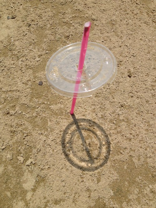 Upright red plastic straw with clear cup lid, Falls of the Ohio, Aug. 2014