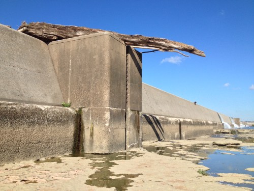 Wall seperating Ohio River from fossil beds, Falls of the Ohio, Sept. 2014