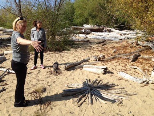 Visitors interacting with my art, Falls of the Ohio, Oct. 2014