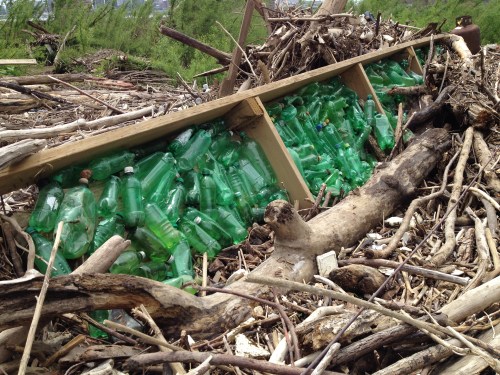 Green plastic bottles in ruined boat dock, Falls of the Ohio, May 2015