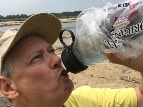 Artist at Exit 0 re-hydrating, Falls of the Ohio, mid Aug. 2015