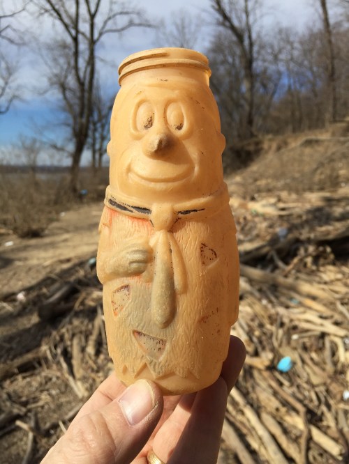 Very faded Fred Flintstone character plastic baby bottle, Falls of the Ohio, Jan. 30, 2016